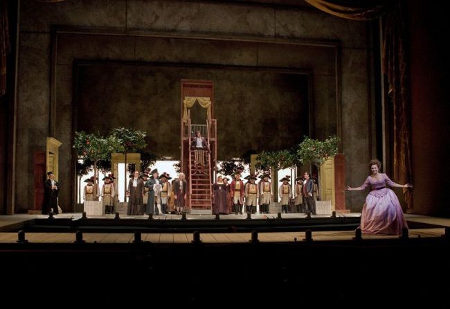 A scene from the Act 2 finale of Rossini’s “Il Barbiere di Siviglia” with Isabel Leonard (front) as Rosina. Photo: Ken Howard/Metropolitan Opera